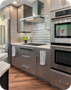 High-Tech Appliances: Culinary Mastery in Stainless Steel G-Shaped Modular Kitchen