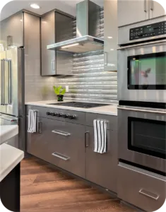 High-Tech Appliances: Culinary Mastery in Stainless Steel G-Shaped Modular Kitchen